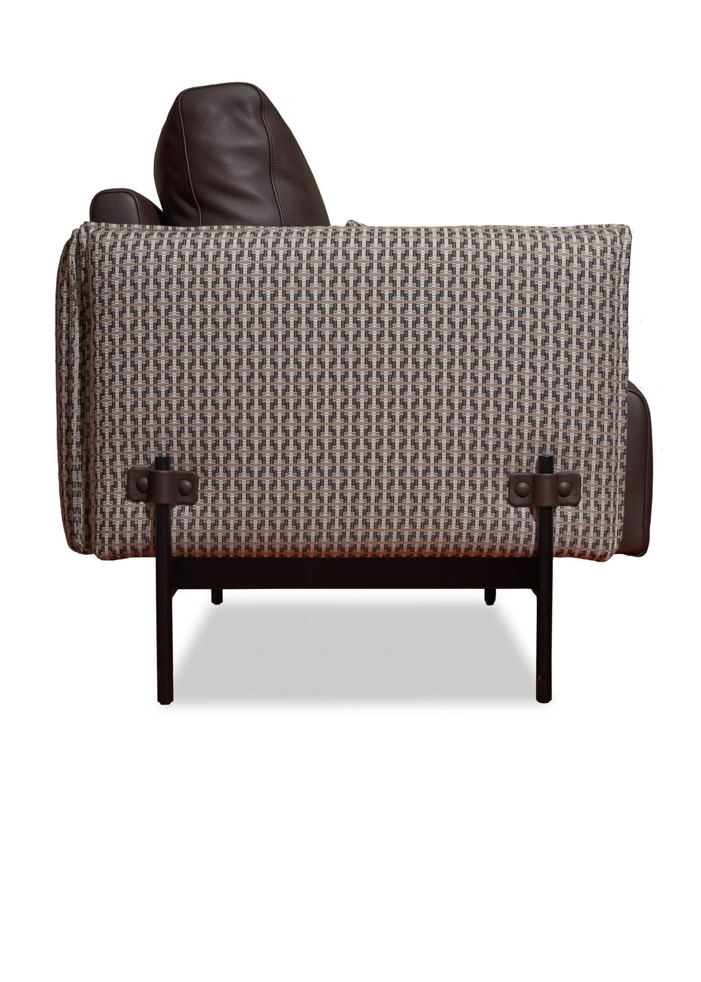 Infinitely practical and individually styled, this unique armchair features mixed upholstery in leather and fabric. A spray-coated steel frame creates a solid structure and support for this durable piece. 